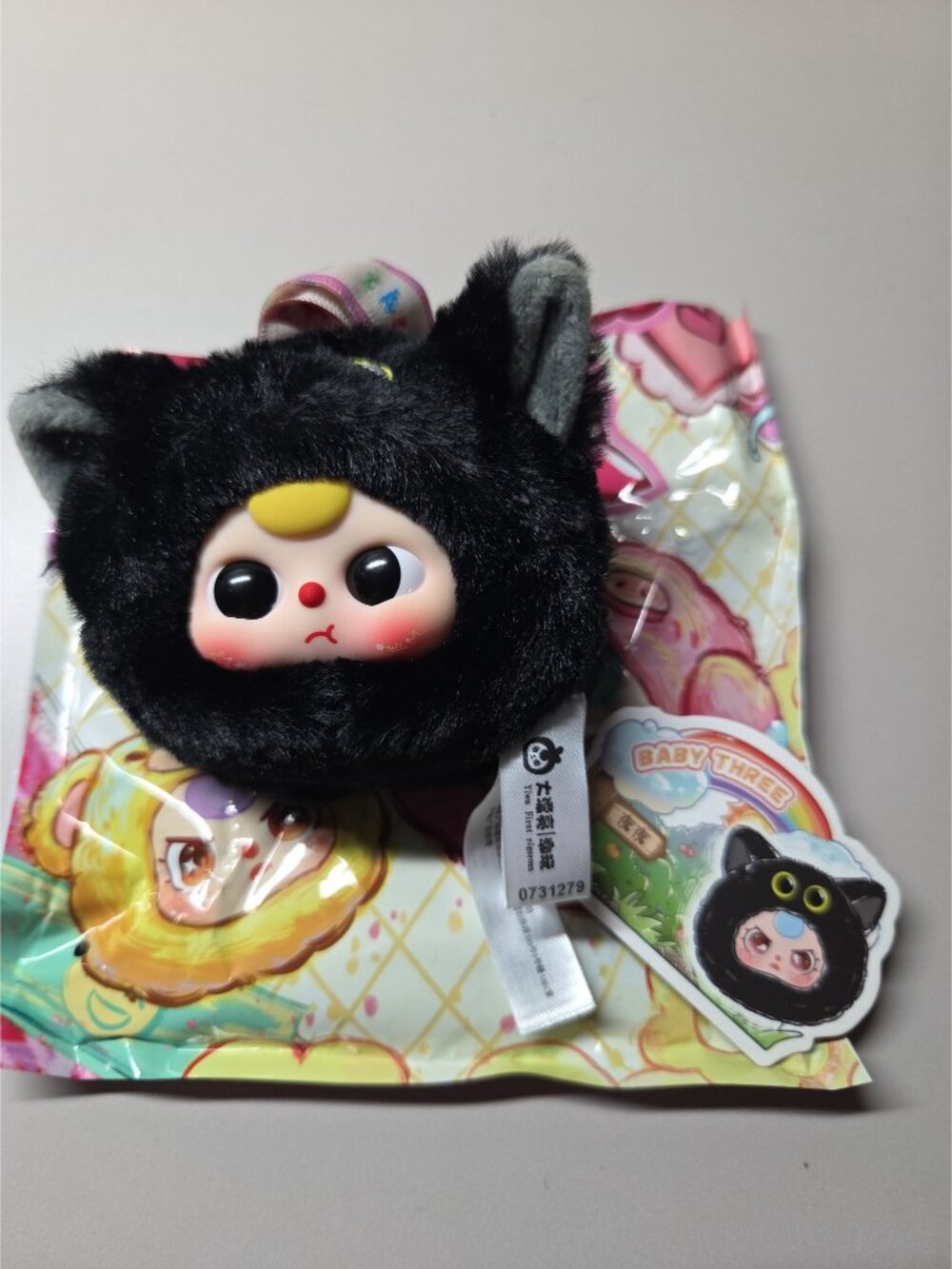 Baby three tiny animal - black cat